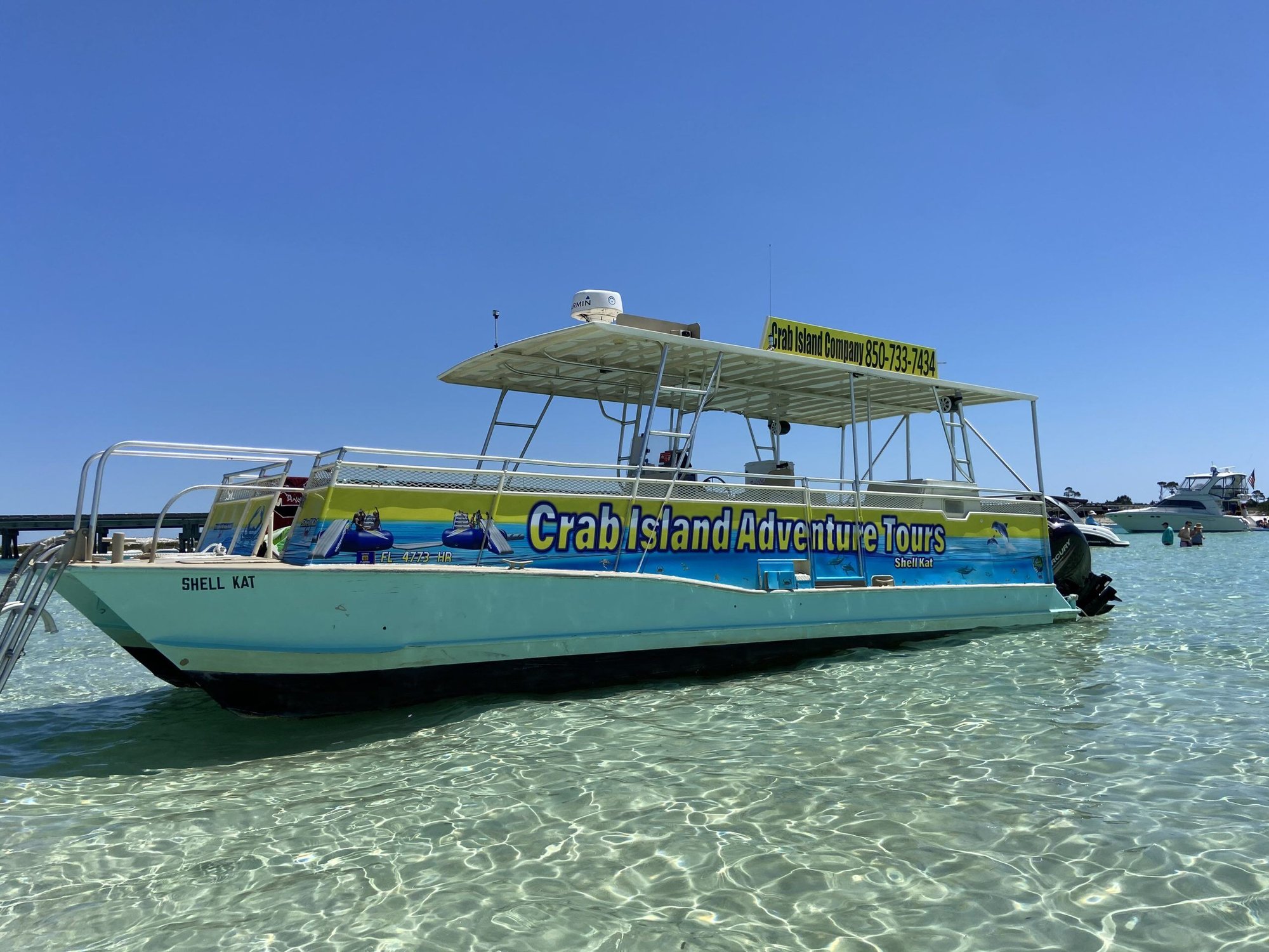 adventure tour boat in the water at crab island