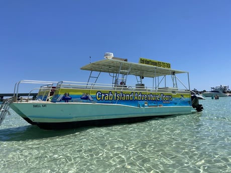 tour boat anchored at crab island