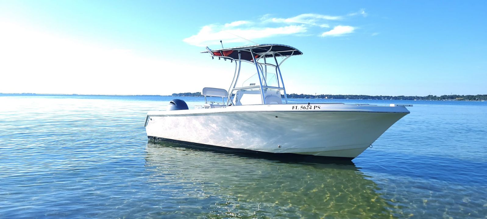 clean large center console boat in the water in destin, florida