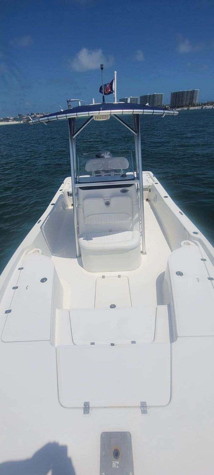 seating on a center console boat in the water