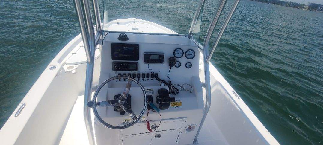 steering controls of a center console boat in destin, florida