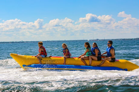 kids on a banana boat ride