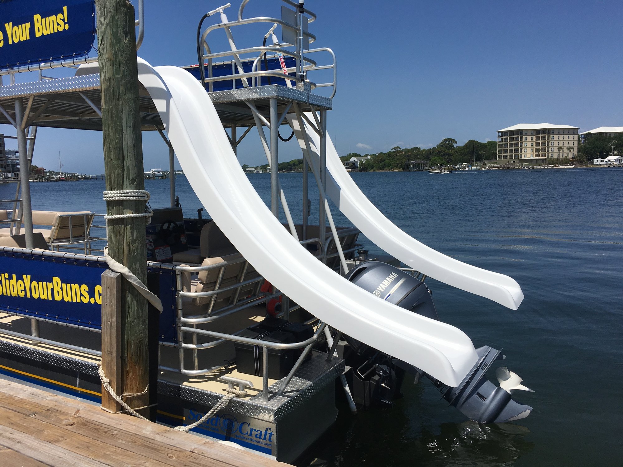 picture of slides on a double decker pontoon boat with two slides in water in destin florida