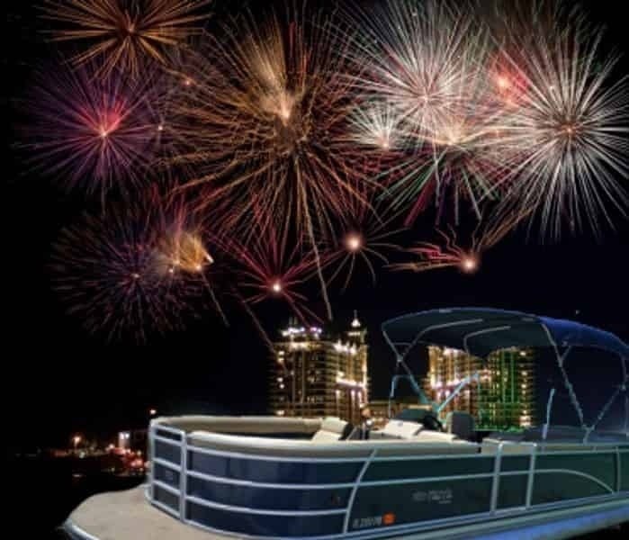 pontoon boat with fireworks in the background