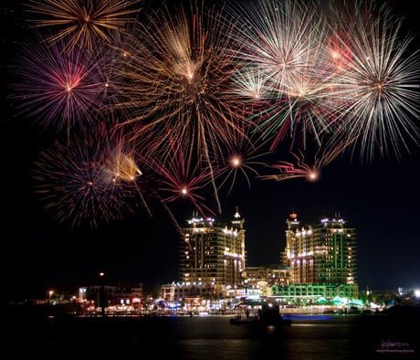 view of a fireworks display over the destin harbor 