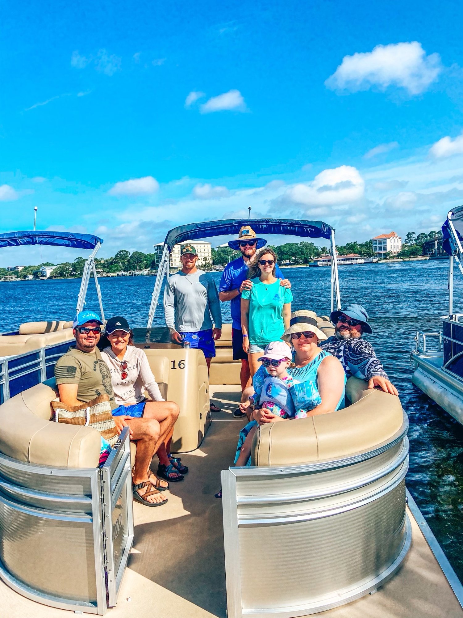 happy family on pontoon boat in destin florida