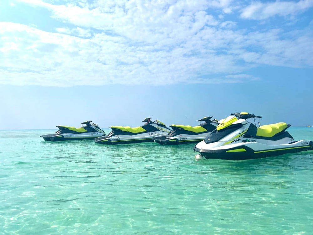 four jet skis in beautiful water at okaloosa island