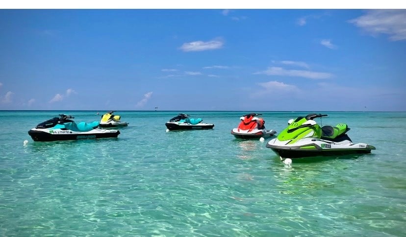 five jet skis in beautiful water at okaloosa island