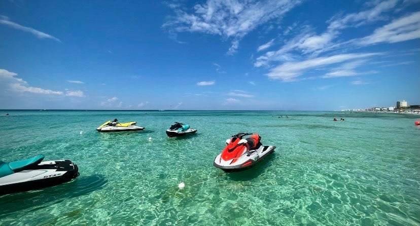 four jet skis in beautiful water at okaloosa island