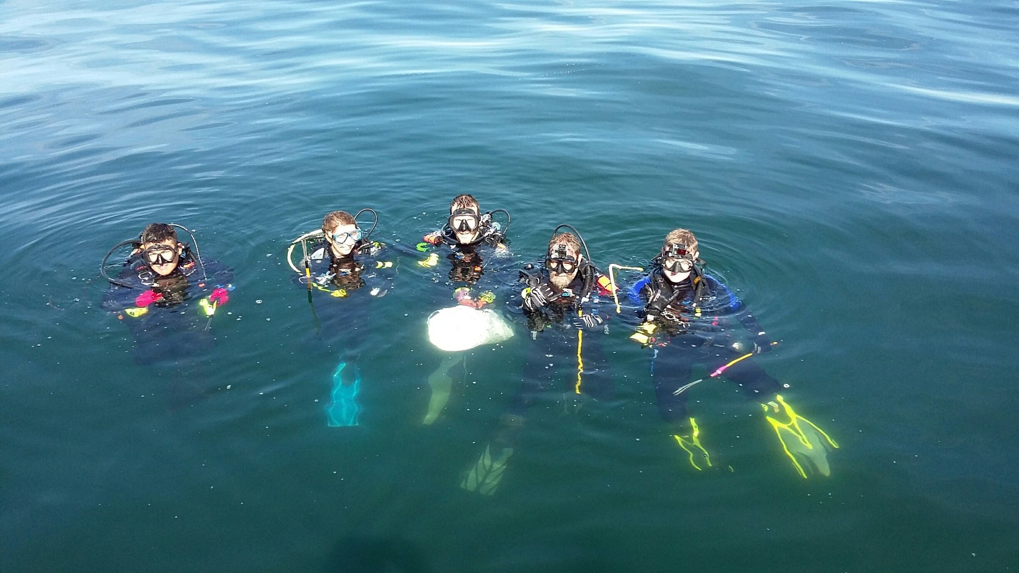 kids spearfishing and diving off the coast of destin florida